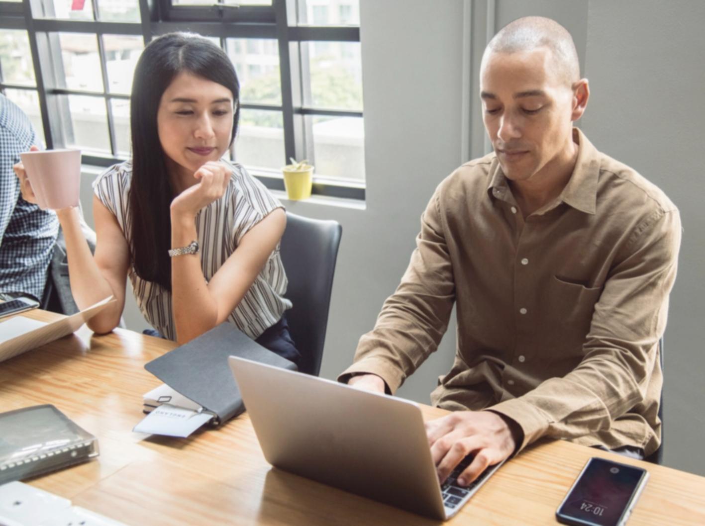 Business owner reviewing budget spreadsheets