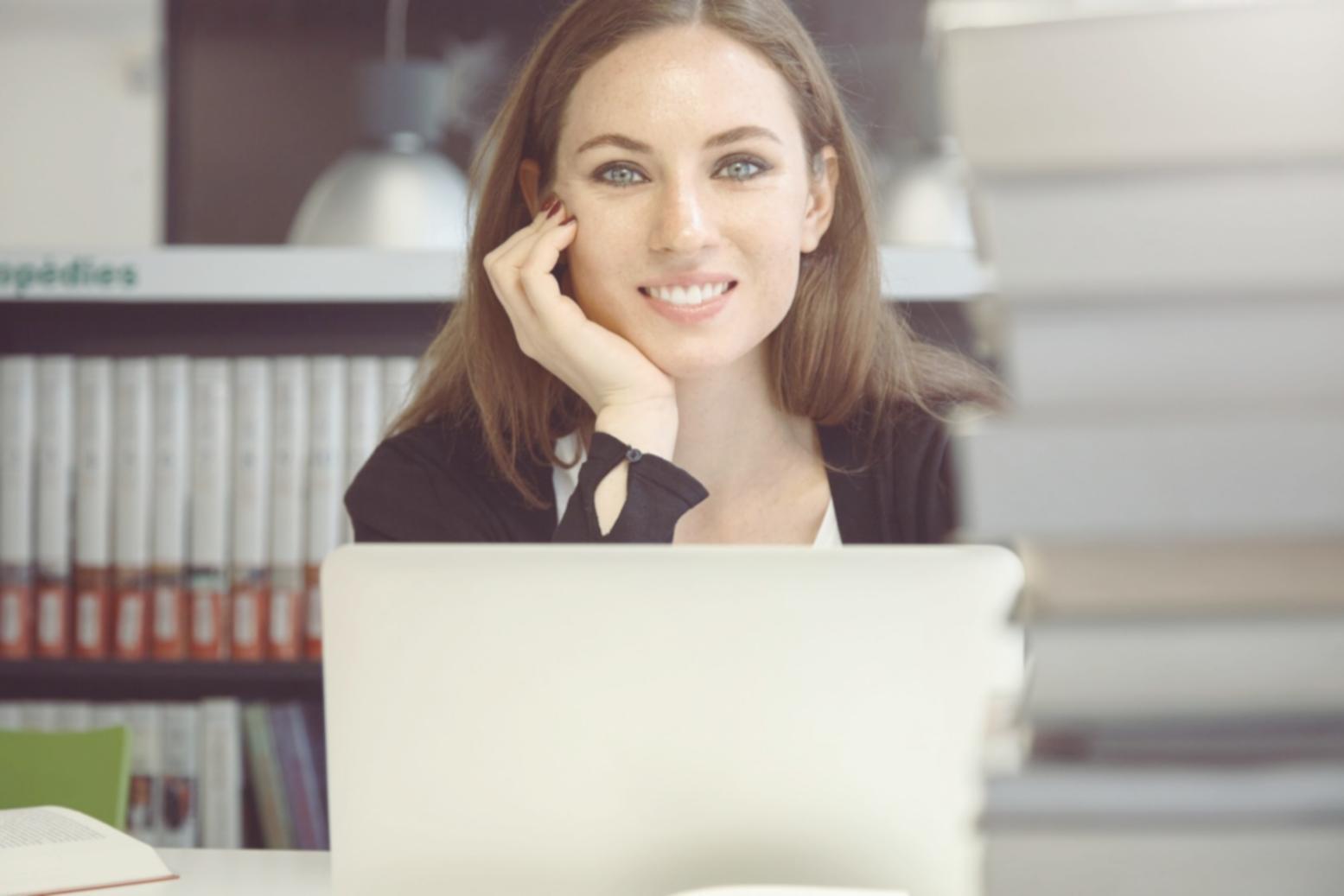 Financial planning workspace with budgeting documents and analysis charts